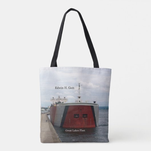 Edwin H. Moet over de canvas tas schieten. (Achterkant)