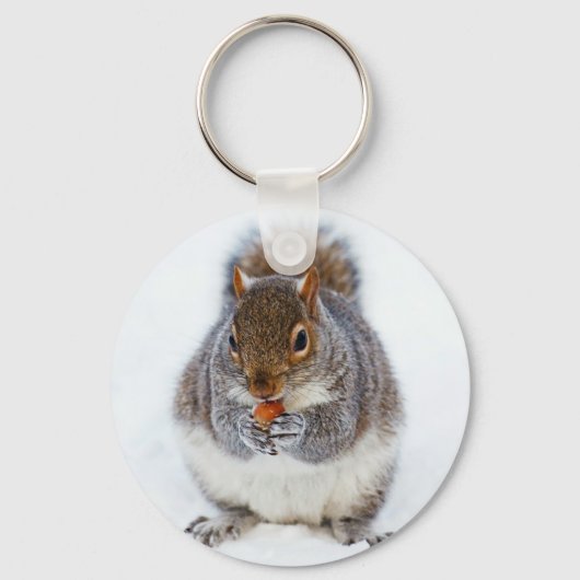 Eekhoorn die een noot eet in wintersneeuw sleutelhanger (Voorkant)