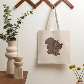 Eekhoorn met een eikel tote bag