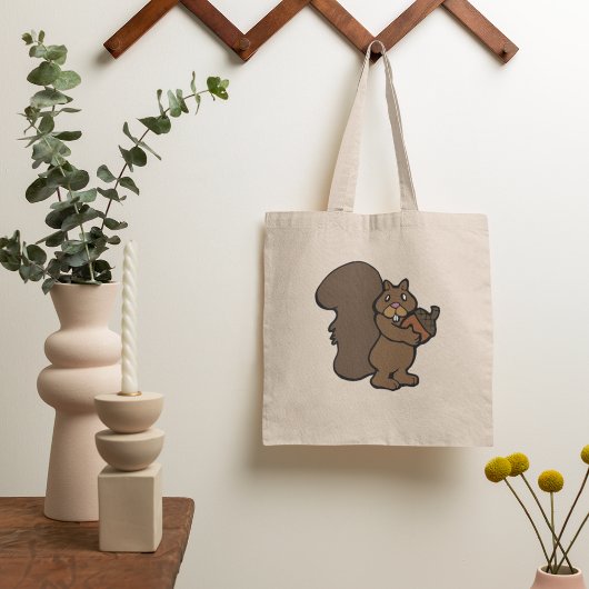Eekhoorn met een eikel tote bag