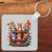 Eekhoorns op een houten boekenplank sleutelhanger (Achterkant)
