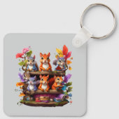 Eekhoorns op een houten boekenplank sleutelhanger (Achterkant)