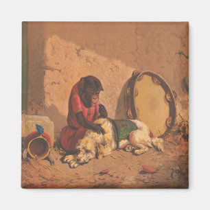 Een aap en een hond met een grote tamboerijn magneet