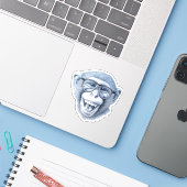 Een aap lachen met een bril sticker (Laptop met iPhone)