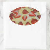 Een aardbeiencake ovale sticker (Tas)