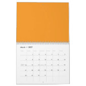Een abstracte mix van levendig sinaasappel, rood e kalender (Mar 2027)