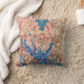 Een afbeelding van een blauw en beige sjaal kussen (Deken)