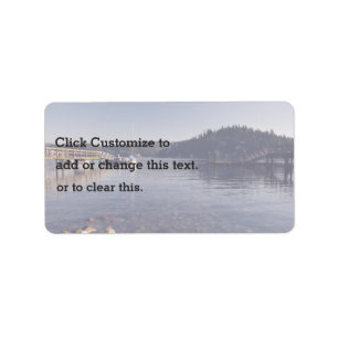 Een Afbeelding van een Shallow Lake met hout Etiket
