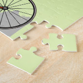 Een Anabisetia dinosaurus op de fiets. Legpuzzel (Zijkant)