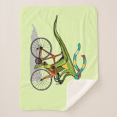 Een Anabisetia dinosaurus op de fiets. Sherpa Deken (Voorkant)