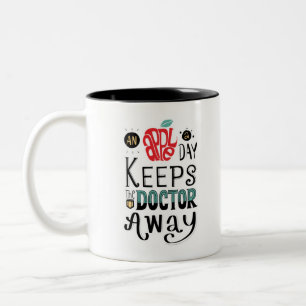 Een appel per dag houdt de dokter weg Quote Tweekleurige Koffiemok