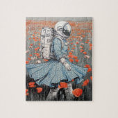 Een astronaut in een blauwe jurk die in klaprozen  legpuzzel (Verticaal)