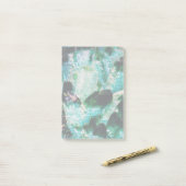 Een aura van smaragden post-it® notes (Op bureau)