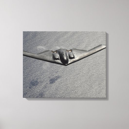 Een B-2-spirietvliegen over de Stille Oceaan Canvas Afdruk (Voorkant)