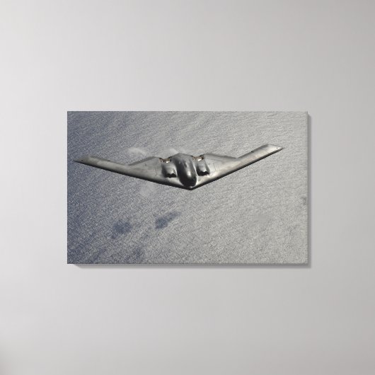 Een B-2-spirietvliegen over de Stille Oceaan Canvas Afdruk (Voorkant)