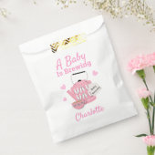 Een Baby is een roze babymeisjesdouche. Bedankzakje (Gezegeld)