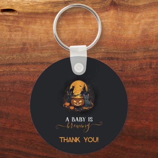 Een Baby is het Baby shower van de stekelkegel Sleutelhanger (Voorkant)