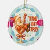 een beetje aangeschoten kerstman keramisch ornament (Links)