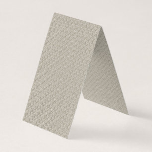 Een beige achtergrond met een patroon van kleine v visitekaartje