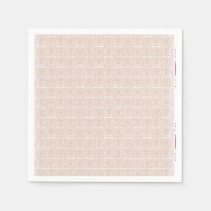 Een beige en wit geruit patroon op een witte achte servet