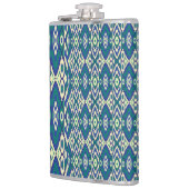 Een blauw en groen patroon met een witte achtergro heupfles (Links)