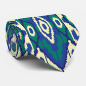 Een blauw en groen patroon met een witte achtergro stropdas (Opgerold)