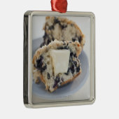Een blauwbes-muffin met boter metalen ornament (Rechts)