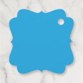 Een blauwe achtergrond met een bedankjes labels (Achterkant)