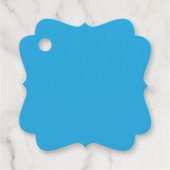 Een blauwe achtergrond met een bedankjes labels (Voorkant)