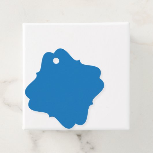 Een blauwe achtergrond met een bedankjes labels (In situ)
