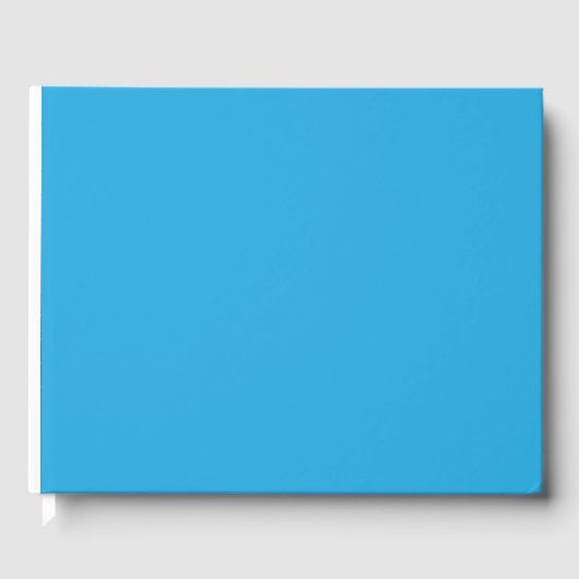 Een blauwe achtergrond met een gastenboek (Voorkant)