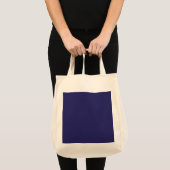 Een blauwe achtergrond met een klok erop tote bag (Voorkant (product))