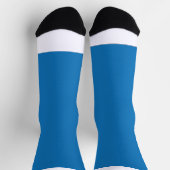 Een blauwe achtergrond met een sokken (Top)