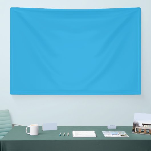 Een blauwe achtergrond met een spandoek (Beurs)