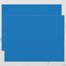 Een blauwe achtergrond met een zwart-witte klok briefhoofd