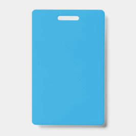 Een blauwe achtergrond met een zwarte en witte kat badge