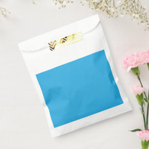 Een blauwe achtergrond met een zwarte en witte kat bedankzakje