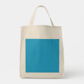Een blauwe achtergrond met een zwarte en witte kat tote bag (Achterkant)