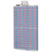 Een blauwe achtergrond met rode en witte design heupfles (Links)
