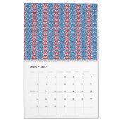 Een blauwe achtergrond met rode en witte design kalender (Mar 2027)