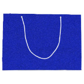 Een blauwe glinsterende cadeautas met witte handva (Achterkant)