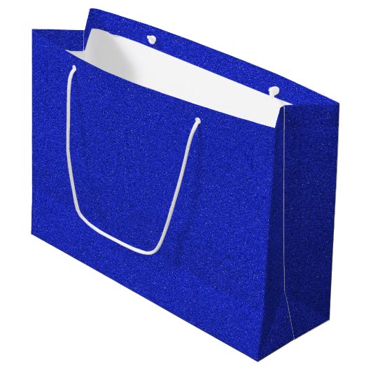 Een blauwe glinsterende cadeautas met witte handva (Voorkant Gekanteld)