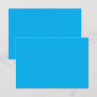 Een blauwe lucht met een vliegtuig