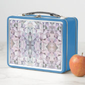 Een blauwe lunchbox met een caleidoscopisch geomet (In situ)
