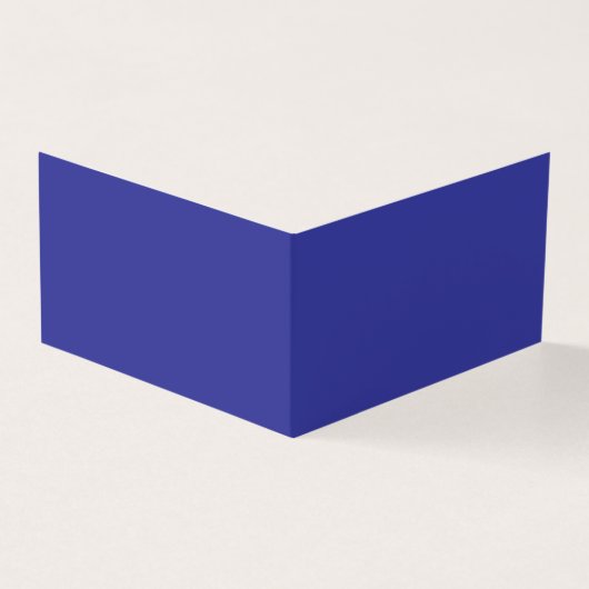 Een blauwe muur met een klok erop kaart (Buitenkant)