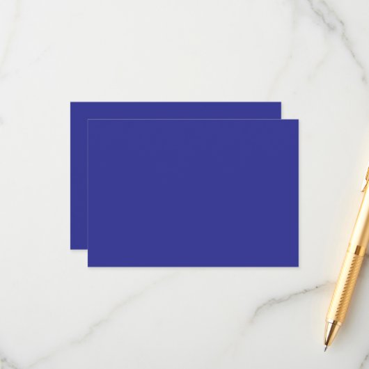 Een blauwe muur met een klok informatiekaartje (Voorkant / Achterkant in situ)