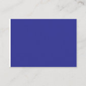 Een blauwe muur met een klok plaatskaartje (Achterkant)