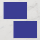 Een blauwe muur met een klok plaatskaartje (Voorkant / Achterkant)