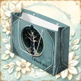 Een blauwgroen, mystieke levensboom. groot cadeauzakje