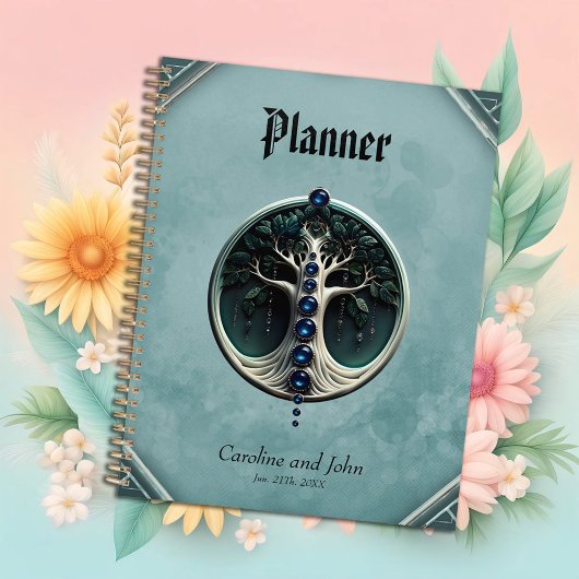 Een blauwgroen, mystieke levensboom. planner